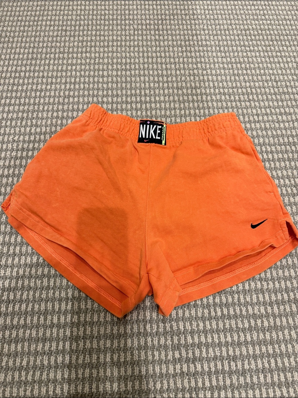 Nike Women's Bright Orange Running Shorts with Swoosh